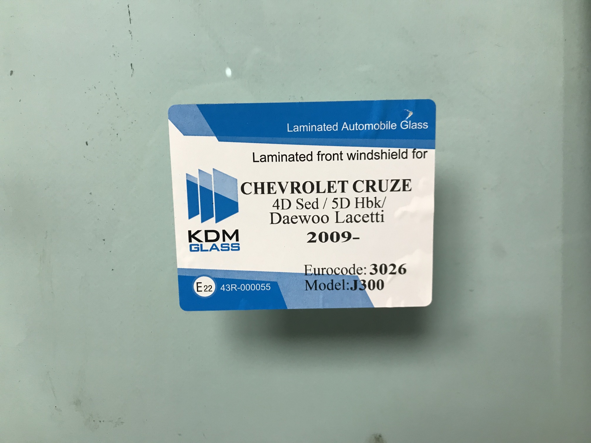 CHEVROLET CRUZE/DAEWOO LACETTI 2009  KDM-ДД ПОЛОСА Стекло лобовое 